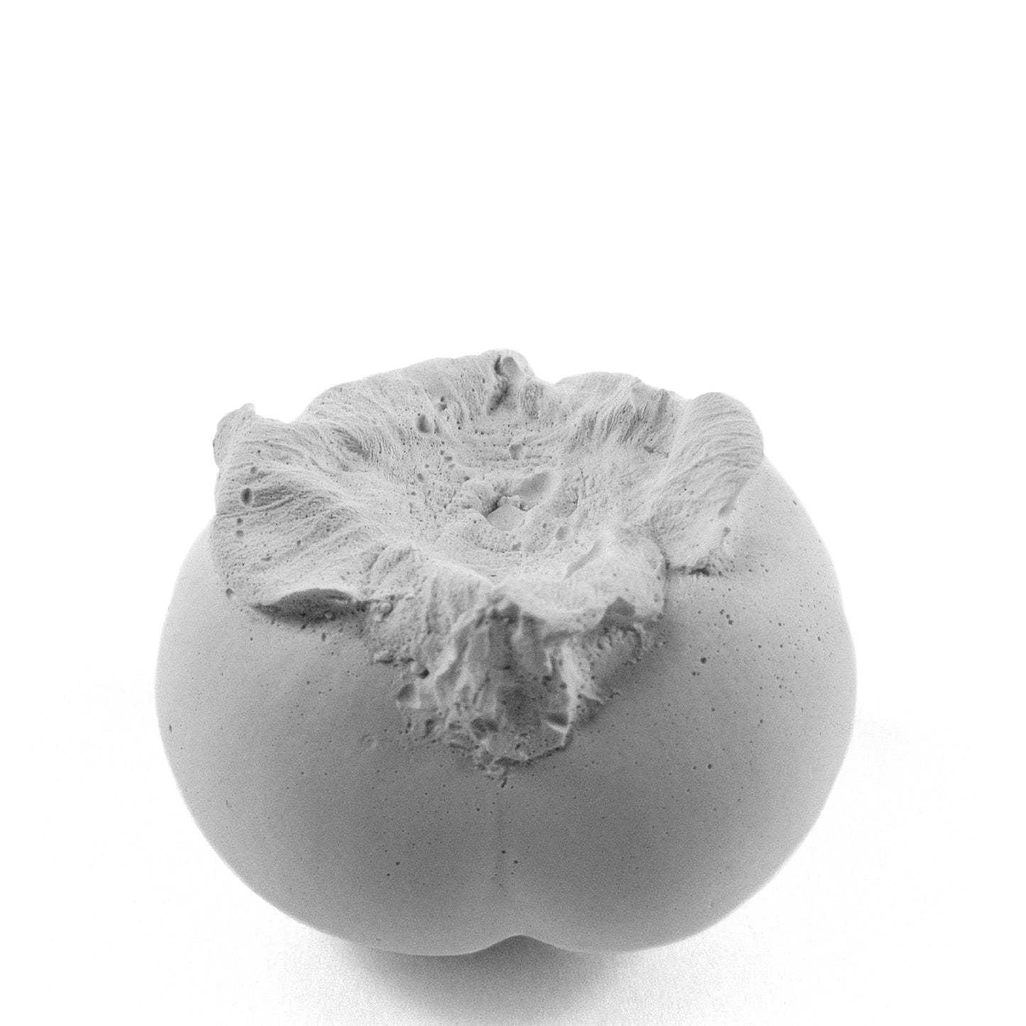 Persimmon made of plaster and fake fruit is all white