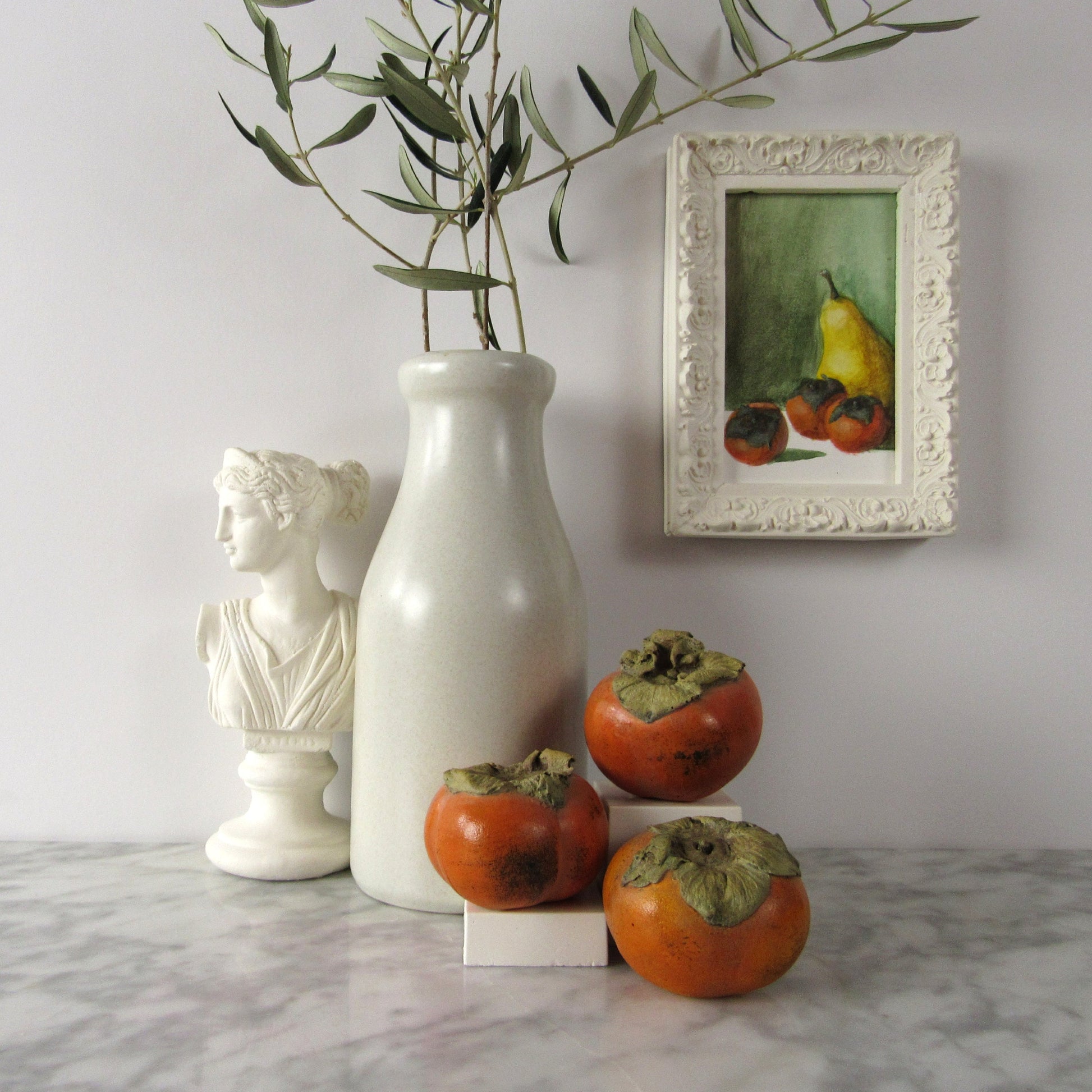 Styling fake fruit and plaster persimmons 