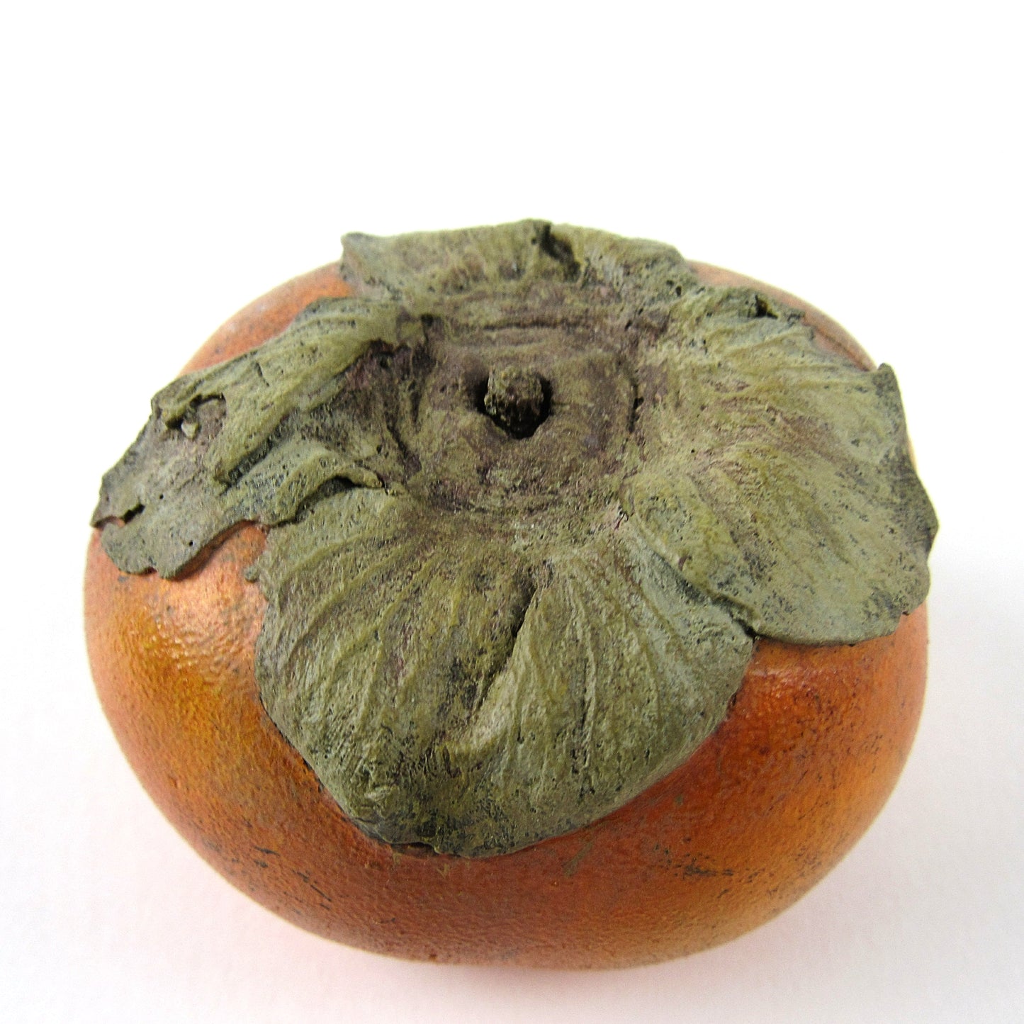 Persimmon sculpture made of plaster and hand painted