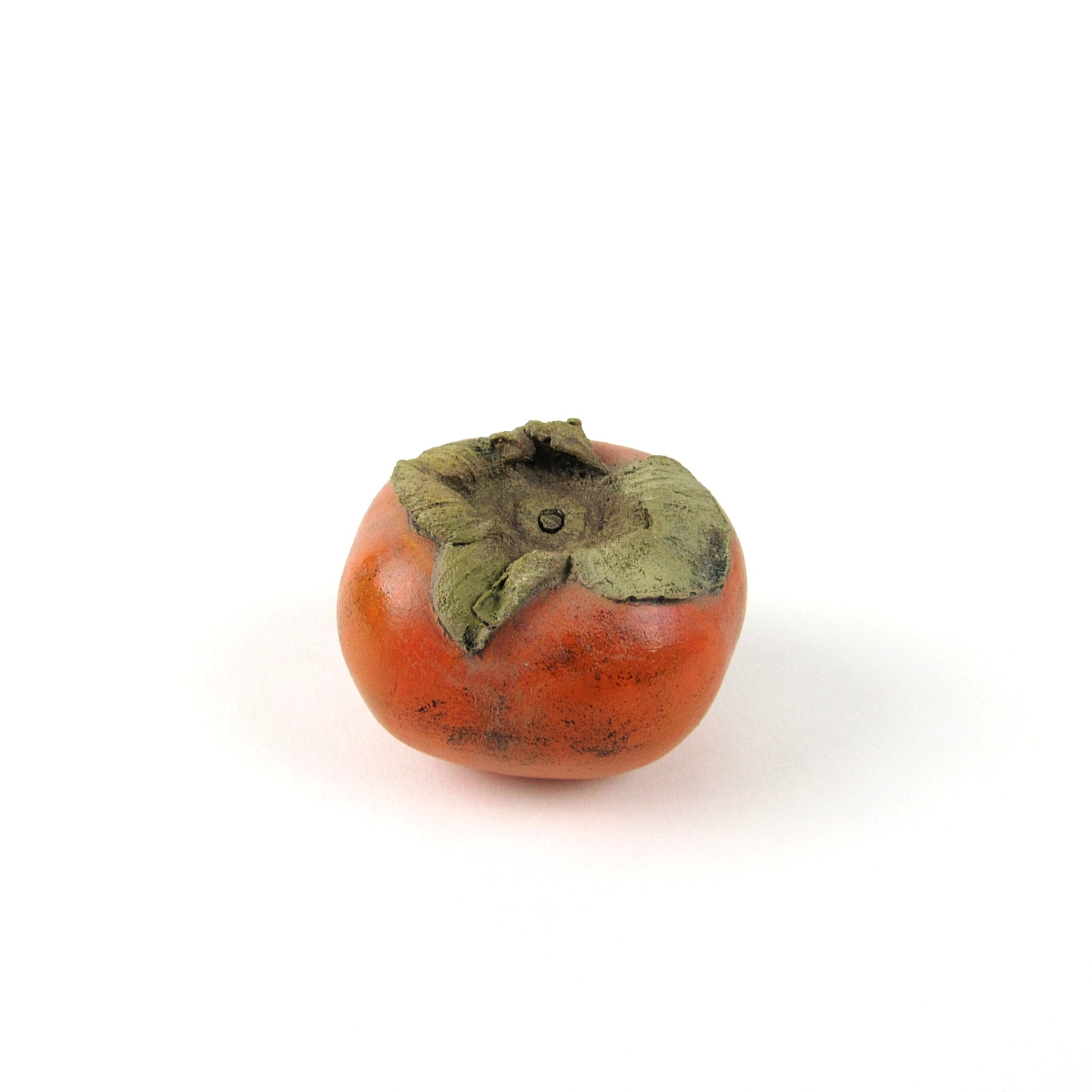 Persimmon made of plaster and hand painted fake fruit