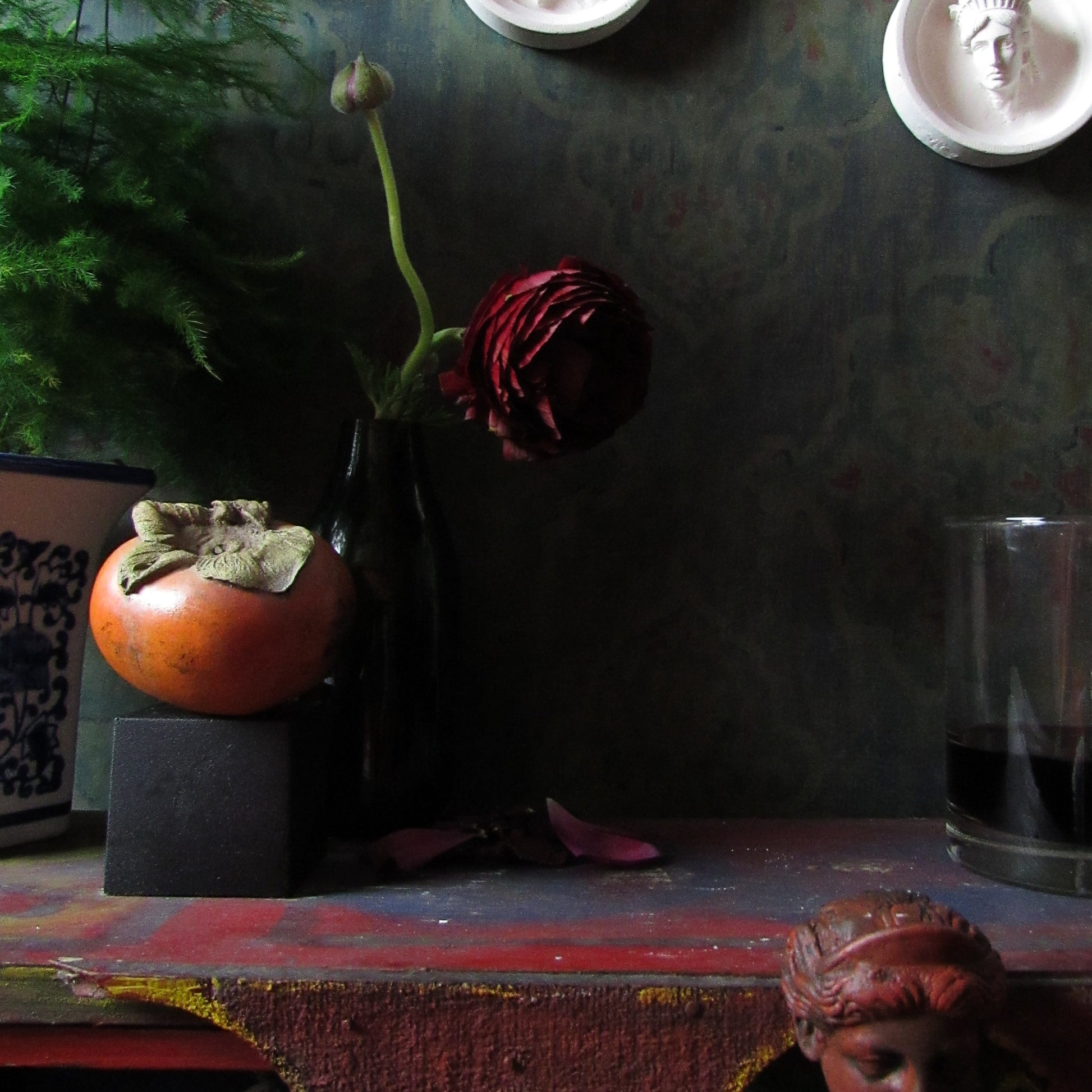 Persimmon made of plaster and hand painted fake fruit. Styled in a vintage vibes